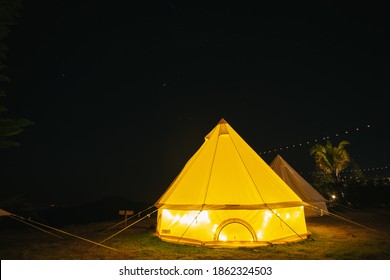 Glamping Camping Teepee Tent In The Dark Night Sky.