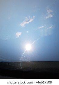 The glare of the sun through a window