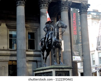 Glasgow, Great Britain - 11 05 2014: Statue of the Duke of Wellington in Glasgow