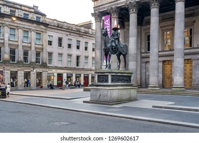 Glasgow, Scotland - April 30, 2011: The equestrian Wellington Statue is a statue of Arthur Wellesley, 1st Duke of Wellington, located on Royal Exchange Square in Glasgow, Scotland. 