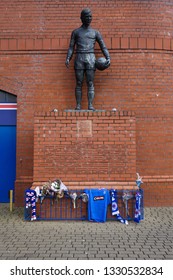 GLASGOW, SCOTLAND - FEBRUARY 24, 2019: The Statue Of John Greig Outside Ibrox Stadium In Glasgow, Scotland
