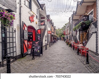 GLASGOW, SCOTLAND - JULY 20: Ashton Lane On July 20, 2017 In Glasgow, Scotland. Ashton Lane Is A Trendy Area With Pubs Close To The University Of Glasgow In The West End. 