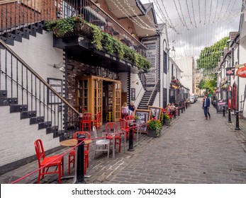 GLASGOW, SCOTLAND - JULY 20: Beautiful Ashton Lane On July 20, 2017 In Glasgow, Scotland. Ashton Lane Is A Trendy Area With Pubs Close To The University Of Glasgow In The West End. 