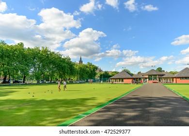 GLASGOW, SCOTLAND - JULY 21, 2016: People Playing Barefoot Bowls At The Kelvin Grove Bowling And Tennis Centre In Summer.