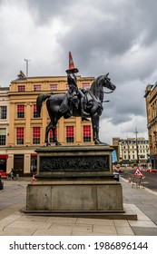 GLASGOW, UK - May , 2021: A view towards the statue of the Duke of Wellington  in Glasgow on a summers day