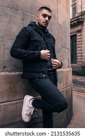 GLASGOW, UNITED KINGDOM - Dec 30, 2021: A Vertical Shot Of A Pakistani Male In An Urban Environment In Glasgow