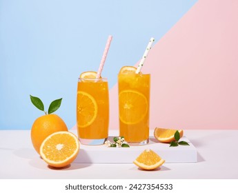 Glass of 100% Orange juice with orange slices fruits on sea beach with white sand. Summer sea vacation and travel concept. Exotic summer drinks. - Powered by Shutterstock