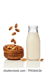 A Glass Of Almond Milk And A Bowl Of Almonds