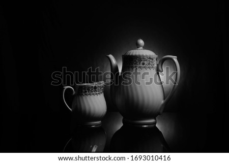 Similar – Tea set on dark background