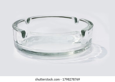 A Glass Ash Tray On White Background