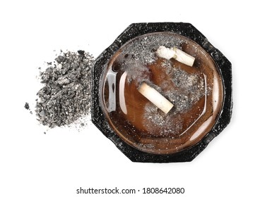 Glass ashtray with cigarette ash isolated on white background, top view