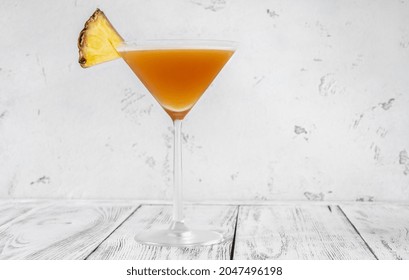 Glass Of Bahamas Daiquiri Garnished With Pineapple Wedge