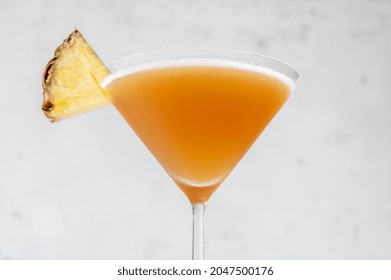 Glass Of Bahamas Daiquiri Garnished With Pineapple Wedge