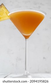 Glass Of Bahamas Daiquiri Garnished With Pineapple Wedge