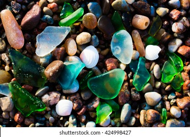 Glass Beach. Natural Texture With Polished Sea Glass, Stones And Sand