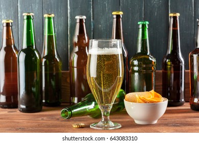 Glass of beer and beer bottle