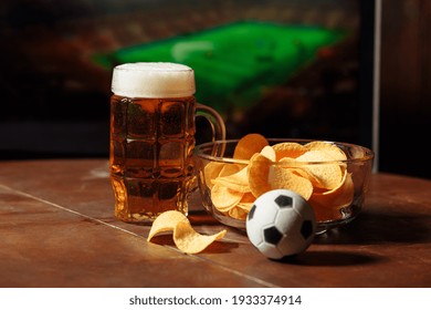 Glass With Beer And Chips. Soccer Fans Idea