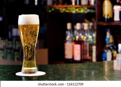 Glass With Beer On The Background Of The Bar