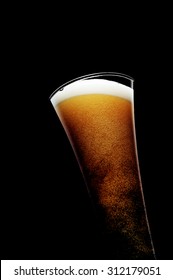 Glass Of Beer On Black Background