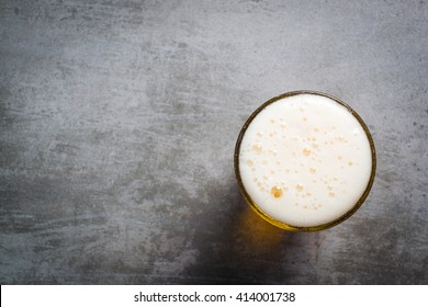 Glass Of Beer On A Concrete Table