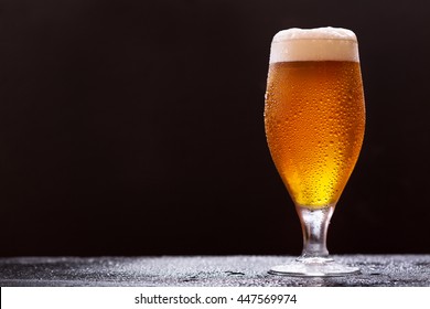 Glass Of Beer On Dark Background