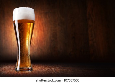 Glass Beer On Wood Background With Copyspace