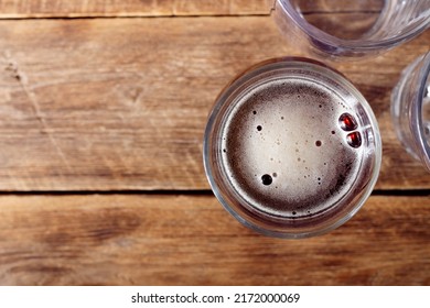 Glass Of Beer  In A Pub Top View Background. 