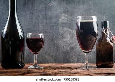 Glass Of Beer And Red Wine With Copy Space For Text On Chalk Board Background