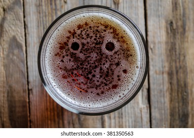 Glass Of Beer Shot Top Down On Wooden Rustic Table