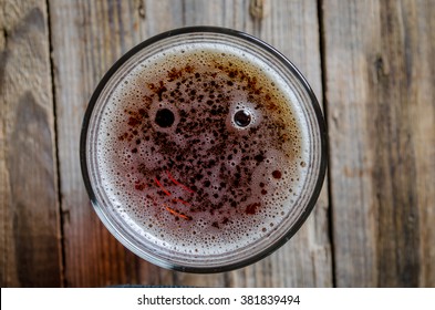 Glass Of Beer Shot Top Down On Wooden Rustic Table