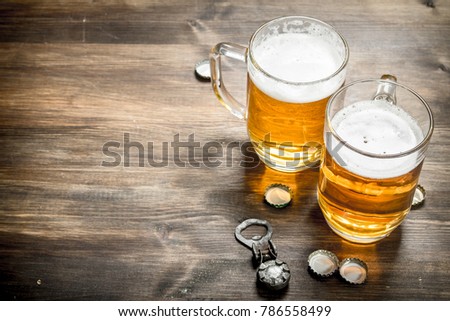 Similar – Image, Stock Photo Glass of beer at sunset at Steinhuder Meer