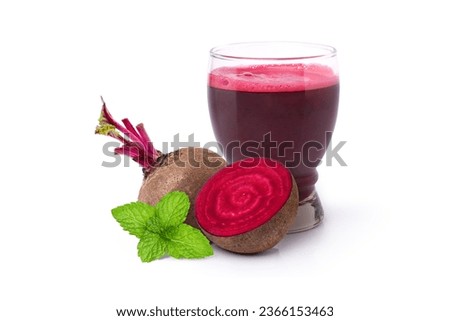 Glass of beetroot smoothie juice with beet root sliced and mint leaf isolated on white background.