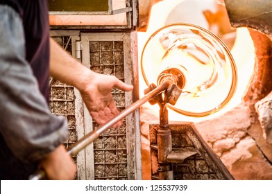glass blower at a factory