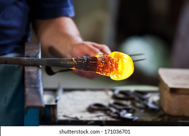 Glass blower forming beautiful piece of glass, Murano, Venice, Italy