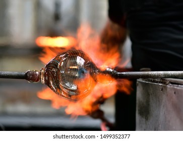 Glass Blowing Art And Flame.
Handmade Glassware Is Produced On High Fire.