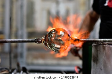 Glass Blowing Art And Flame.
Handmade Glassware Is Produced On High Fire.