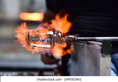 Glass Blowing Art And Flame.
Handmade Glassware Is Produced On High Fire.