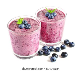 Glass Of Blueberry Smoothie Isolated On White