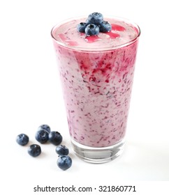 Glass Of Blueberry Smoothie Isolated On White