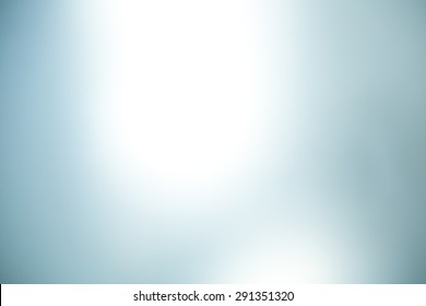 Glass Blurry Photo.Light Gray Abstract Background.