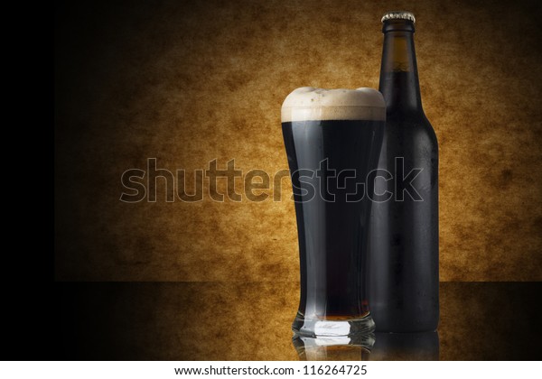 Download Glass Bottle Dark Beer On Yellow Royalty Free Stock Image PSD Mockup Templates