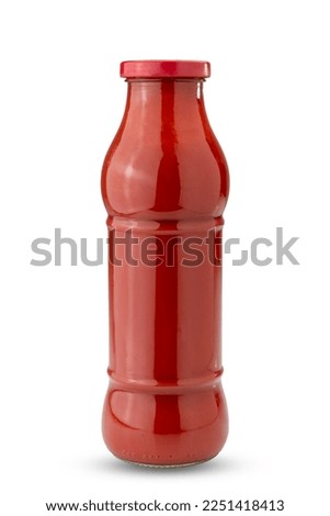 Glass bottle jar of tomato puree isolated on white, clipping path included