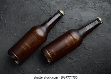 Glass Bottles Of Beer Set, On Black Stone Background, Top View Flat Lay