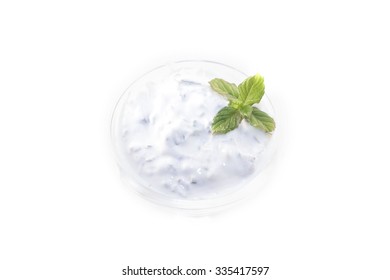 A Glass Bowl Full Of Tzatziki Sauce, Isolated On White Background