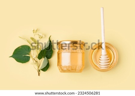 Similar – Image, Stock Photo Honey flows from glass and flowers