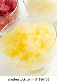 Glass Bowl With Orange Granita. Shallow Dof.