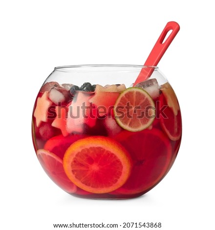 Glass bowl of Red Sangria and ladle isolated on white