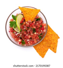 Glass Bowl Of Tomato Salsa Dip With Tortilla Chips Isolated On White Background