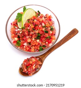 Glass Bowl Of Tomato Salsa Dip With Tortilla Chips Isolated On White Background