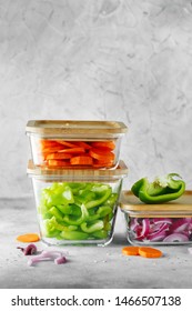 Glass boxes with fresh raw vegetables. Healthy Meal Prep - recipe preparation photos. Healthy vegan dishes in glass containers. Weight loss food concept